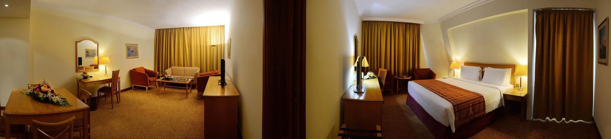 Swiss-Belhotel Шарджа Стая снимка